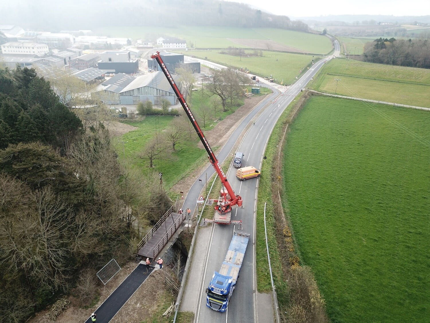 New active travel bridge lowered into position to complete construction of the shared use path between Bow Street and IBERS